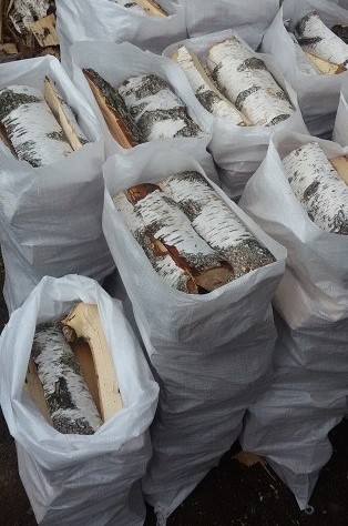 дрова березовые колотые в мешках